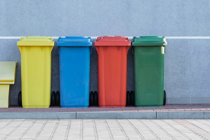 Sorted household recycling and rubbish bins