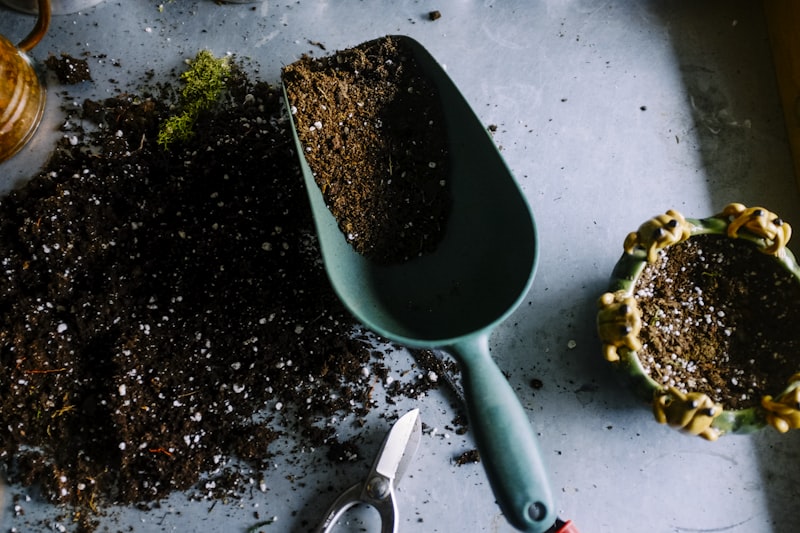Green garden waste pile with branches and leaves